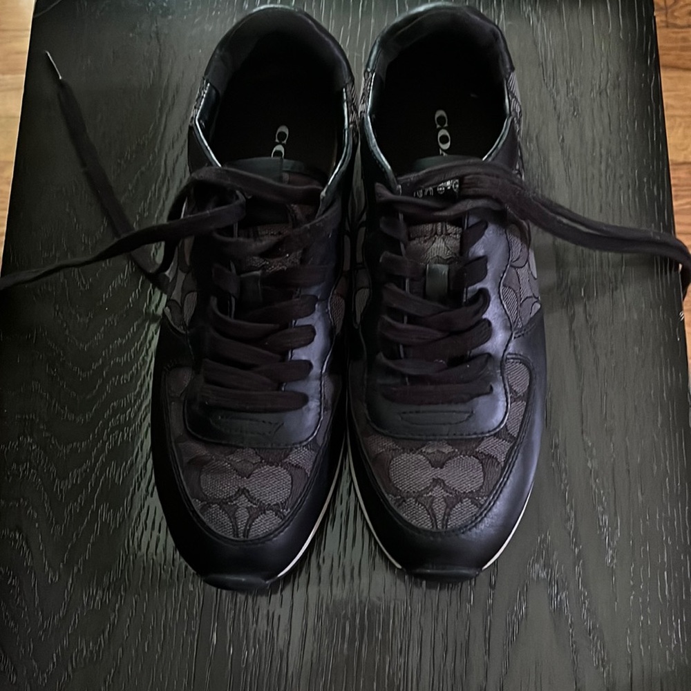 Couch sneakers black with some gray. Only worn once